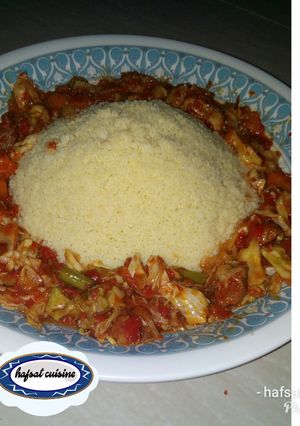 A picture of Couscous and vegetable soup.