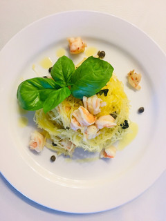 A picture of Spaghetti Squash with Shrimp and Capers.