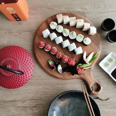 A picture of Californian Rolls and Tuna sushi.