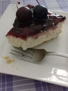 Una foto de Cheesecake con frutos rojos