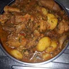 A picture of Chicken with potatoes.