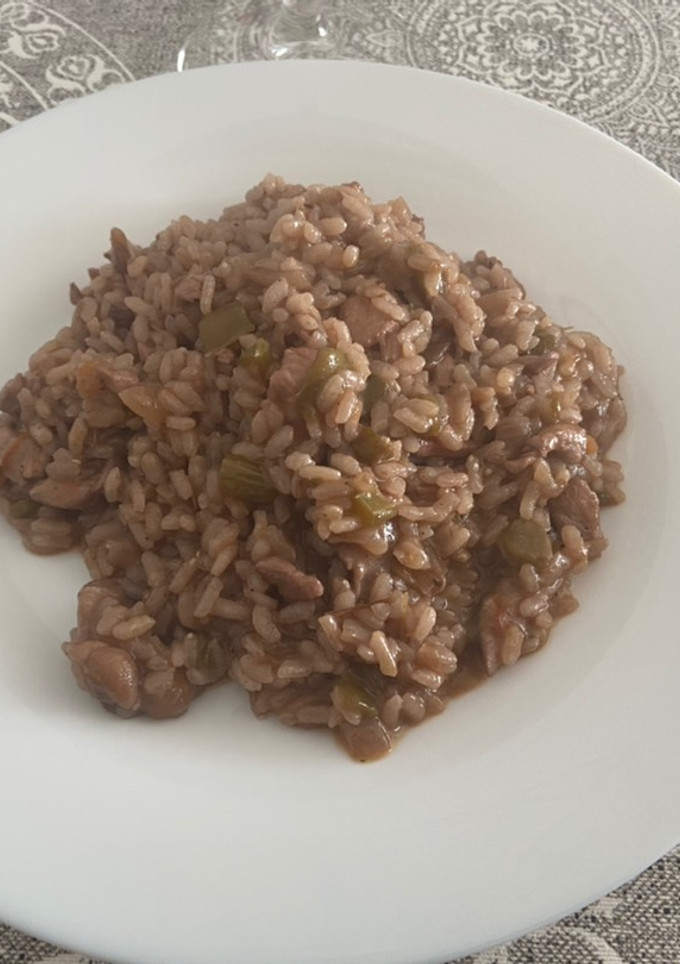 Una foto de Arroz meloso con pollo