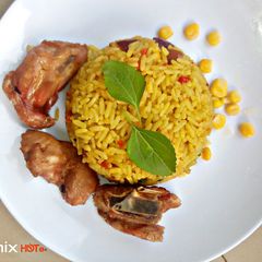 A picture of Fried rice with chicken.