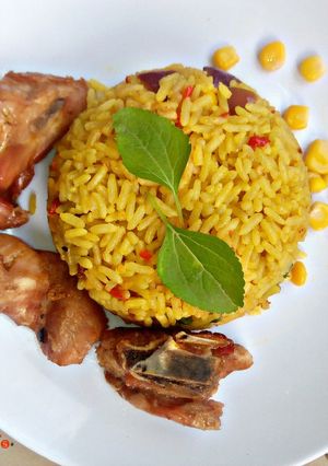 A picture of Fried rice with chicken.