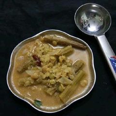 A picture of Drumstick - Mango Curry.