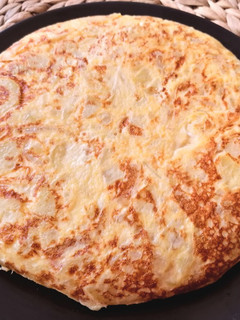 Una foto de Tortilla de patatas estilo Betanzos (con cebolla)