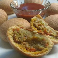 A picture of Mix dal stuffed baked bonda.