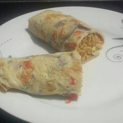 A picture of Noodles in omelette wrap.
