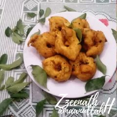 A picture of 2 Lentil Medu Vadas.