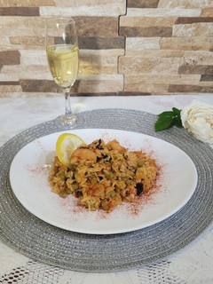 Una foto de Paella de mariscos