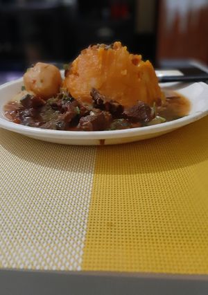 A picture of Beef Chemsha with Mashed Butternut and Potatoes.