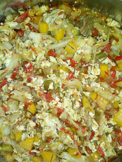 A picture of Cabbage and egg sauce.