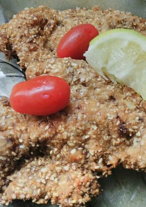 Una foto de Milanesas de bola de lomo de cerdo con empanado especial