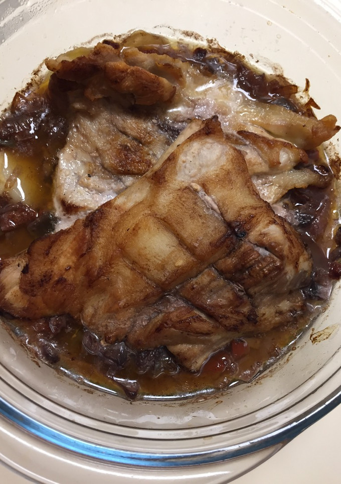 Una foto de Secreto ibérico al horno con vino tinto