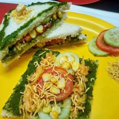 A picture of Coriander chutney veggie corn bhajia sandwich.