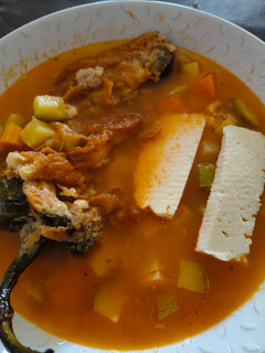 Una foto de Chiles rellenos en caldillo