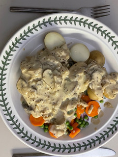 A picture of Pheasant breast in a sour cream sauce.