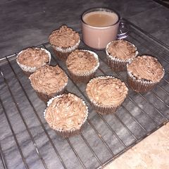 A picture of Chocolate cupcakes with buttercream Frosting.