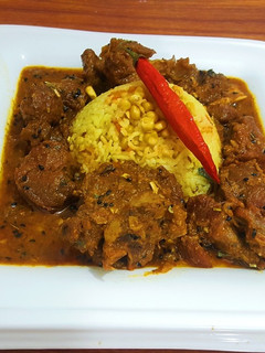 A picture of Dhaba Mutton with corn pulao.