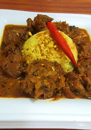 A picture of Dhaba Mutton with corn pulao.