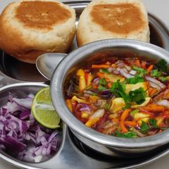 A picture of Moth beans misal pav.