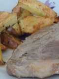 Chuleta de cerdo con papas asadas