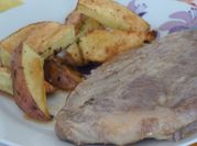 Una foto de churrasco de cerdo