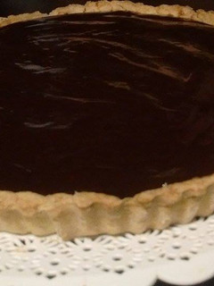Una foto de Tarta de dulce de leche y ganache