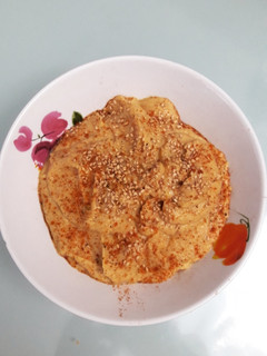Una foto de Hummus con semillas