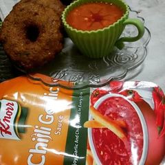 A picture of Moong daal khatti tikki with Tangy sauce.