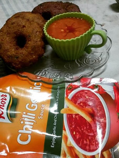 A picture of Moong daal khatti tikki with Tangy sauce.