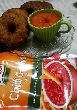 A picture of Moong daal khatti tikki with Tangy sauce.