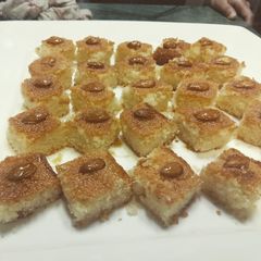 A picture of Basbousa / semolina cake.