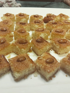 A picture of Basbousa / semolina cake.