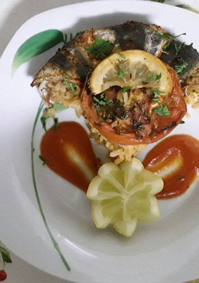 Una foto de Las sardinas con arroz al horno