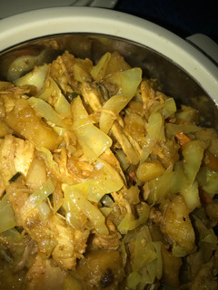 A picture of Chicken and cabbage stir fry.