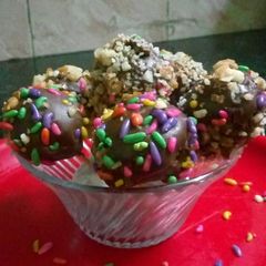 A picture of Dry fruit chocolate lollipops.