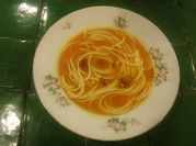 Una foto de caldo de tocino