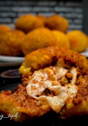 Une photo de Arancini