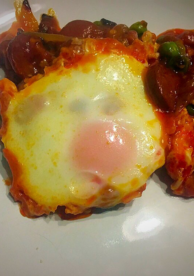 Una foto de Huevos a la flamenca