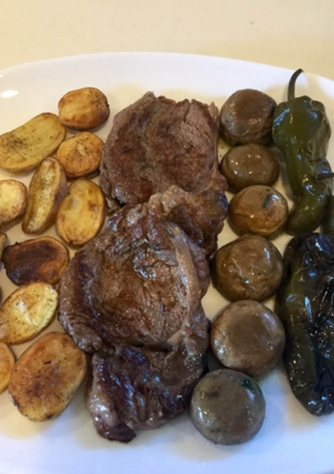 Una foto de Solomillo de buey con champiñones