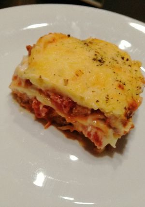 A picture of Cheesy, saucy lasagna.