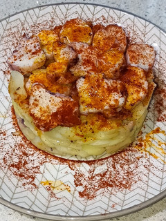Una foto de Timbal de papas con pulpo