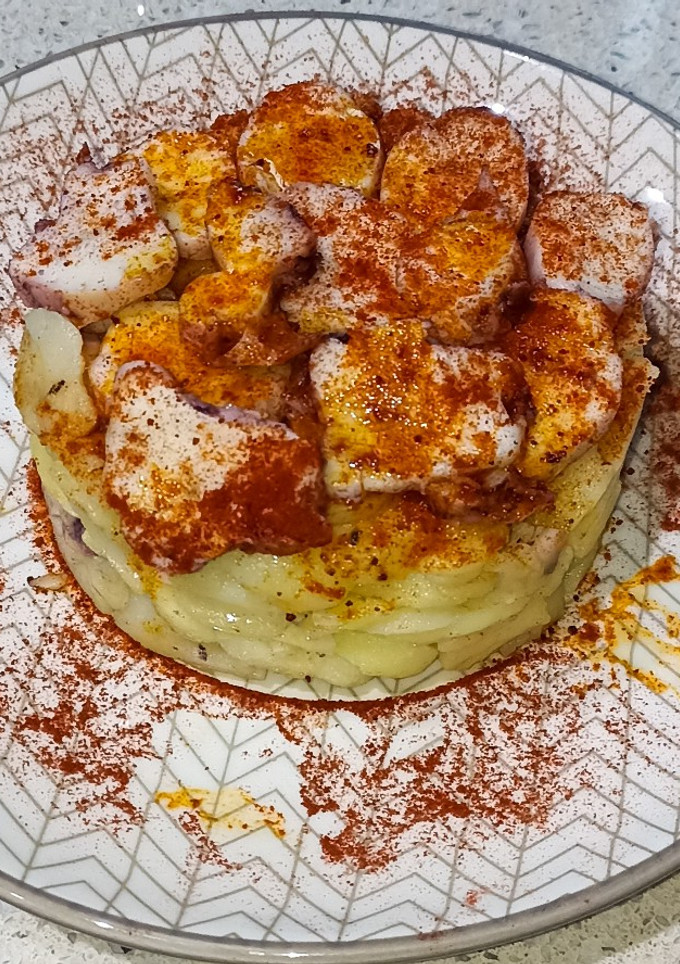 Una foto de Timbal de papas con pulpo