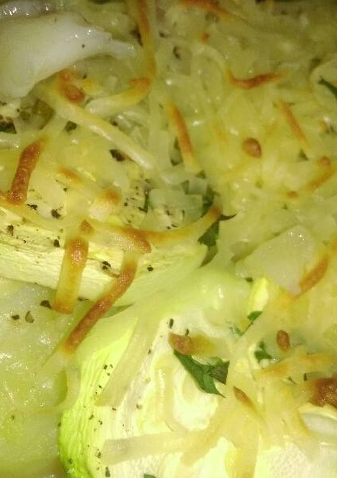 Una foto de Lenguado con calabacines y queso