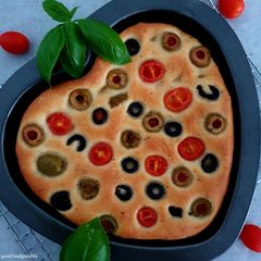 A picture of Olives cherry tomatoes Focaccia.