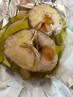 Una foto de Merluza al papillote con aceite de ajo