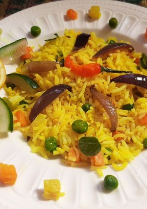 A picture of Fried rice with haldi(Haldi have medical properties for health).