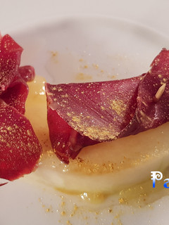 Una foto de Melón braseado con cecina de León