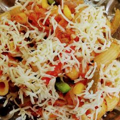 A picture of Tiffin Box Macaroni in Red Sauce.